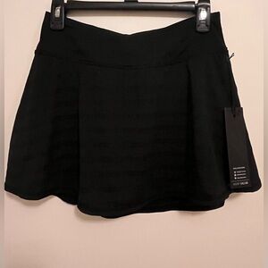 black golf skort. cute, never worn with tags. size small